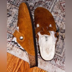 Women’s gently used Birkenstock Shearling Boston clogs.